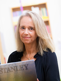 photograph of a smiling woman